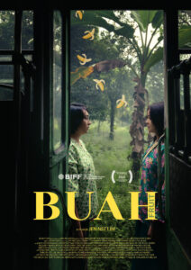 Poster for the short film Buah (Fruit) by Jen Nee Lim. Two women stand facing each other in the doorway of a green bus, surrounded by lush tropical vegetation and banana trees. Small illustrated banana peels float between them. The film title "BUAH" in large yellow text is at the bottom, with the English translation "FRUIT" vertically beside it. Credits and crew information appear below the title.
